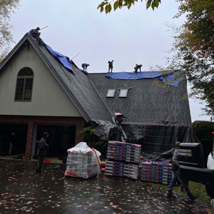 Crew Working On A Roof